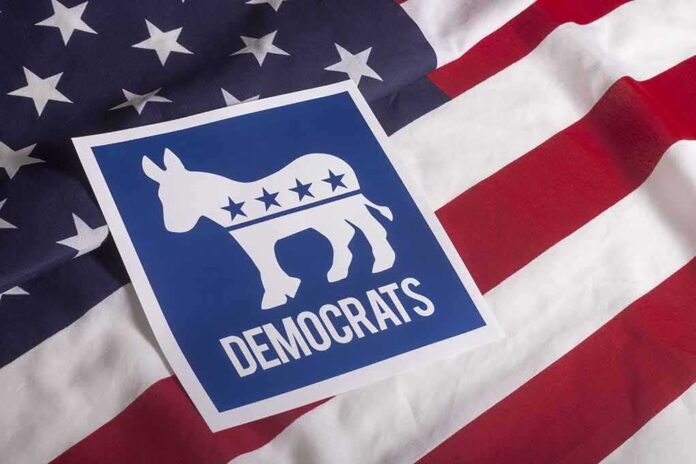 305852246 featured image Democrats sign on American flag background.