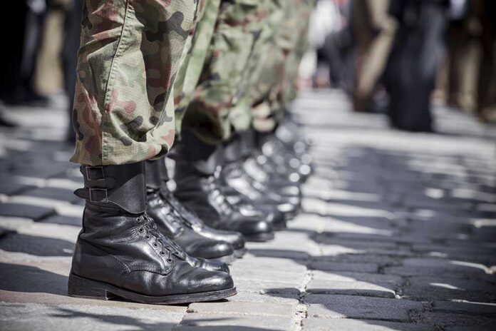 112917010 featured image Soldiers in uniform and boots standing in formation.