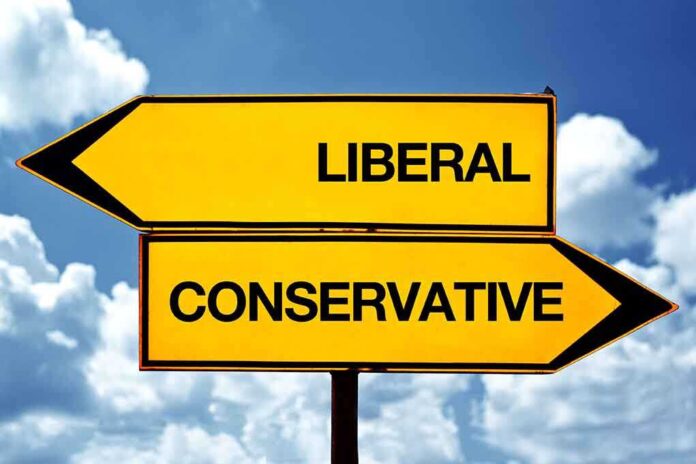 143657260 featured image Liberal and conservative road signs against sky background