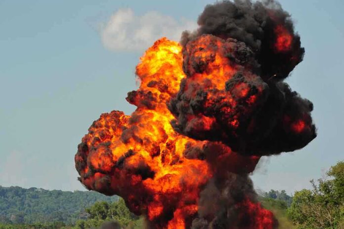 1043936473 featured image Large explosion with fireball and smoke cloud.