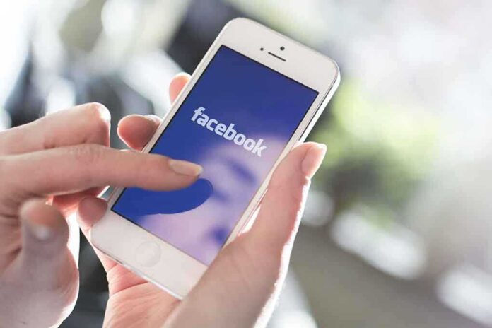 173594540 featured image Person using Facebook on a smartphone