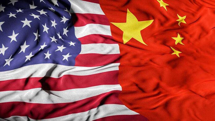 1831548649 featured image American and Chinese flags overlapping together