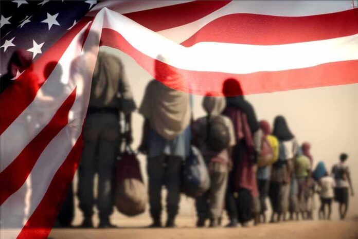 2326081723 featured image Line of people walking under American flag overlay.