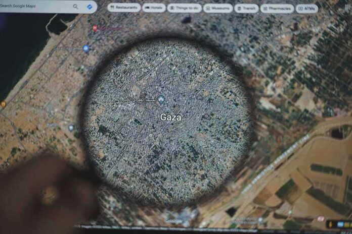 2372300801 featured image Map of Gaza viewed through a magnifying glass