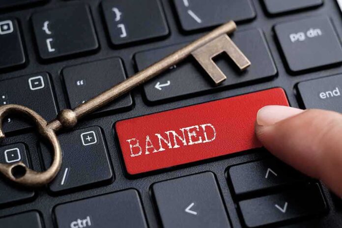 566431402 featured image Banned button on keyboard with a skeleton key.