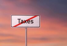 Sign with the word Taxes crossed out