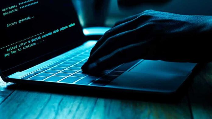1166453734 featured image Hand typing on laptop with code on screen