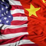 United States and China flags merged together.