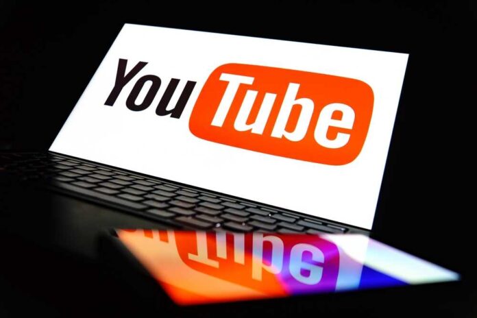 2494901957 featured image YouTube logo on a laptop and smartphone screen