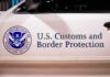U S Customs and Border Protection vehicle logo and text