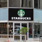 Starbucks storefront with glass doors and logo