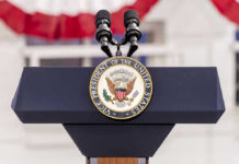 Vice Presidential podium with microphones and emblem