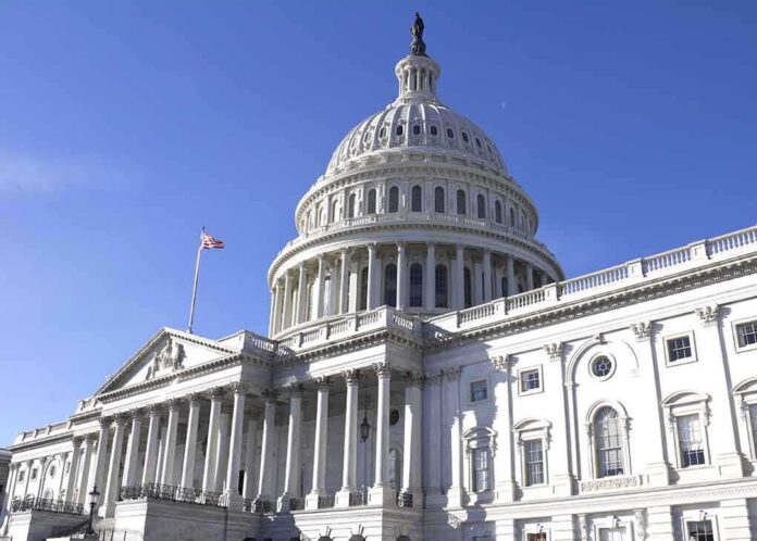 The U.S. Capitol building with a clear blue sky in the background