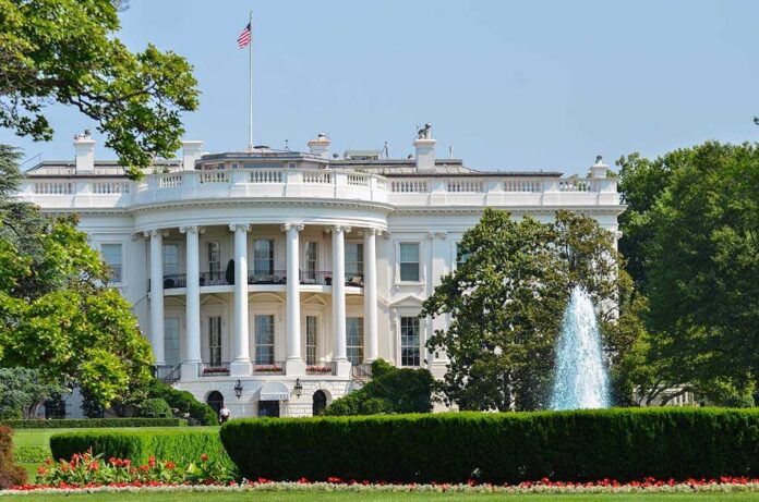 The White House surrounded by gardens and a fountain