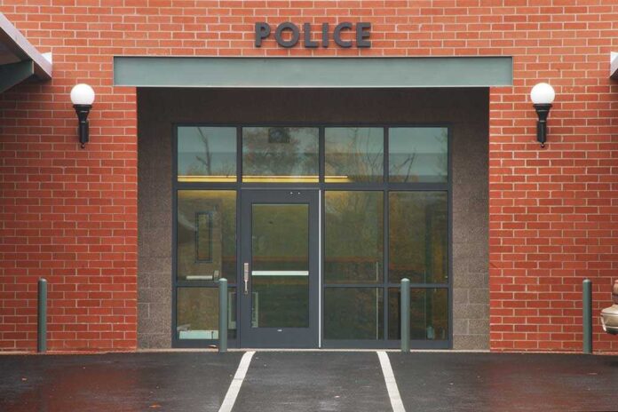 Entrance of a modern police station with brick facade