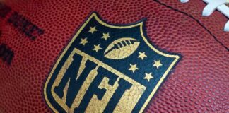 Close-up of an NFL football with the logo prominently displayed