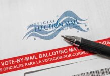 Republicans Used Mail Ballots MORE—Narrative Implodes Official election mail envelope with a pen beside it