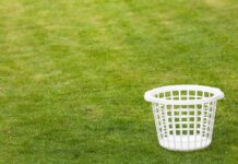 Looney Liberal Declares Lawns Racist—Internet ERUPTS An empty white laundry basket placed on green grass