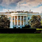 Hidden Camera CATCHES White House Staffer Doing THIS! The White House surrounded by greenery and a fountain in the foreground
