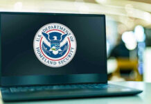 Trump Orders Treasury Sec to SEIZE Illegal Aliens Bank Accounts Laptop displaying U.S. Department of Homeland Security logo.