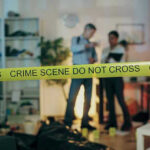 Gay Couple Abused, KILLED Adopted Child! Crime scene with tape and investigators examining evidence.