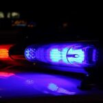 Babysitter From Hell ARRESTED – Horrific Negligence! Close-up of police lights flashing in blue and red at night