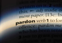 Illegal Alien KIDNAPS Disbaled Girl – PARDONED! The word pardon highlighted in a dictionary.
