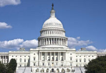 Vanished Congressman RETURNS – Missing For 4 MONTHS! U.S. Capitol building against blue sky.