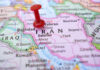 Muslim Mayor Schedules SECRET Meeting With Iran Leadership! Red pushpin marking Iran on a map.