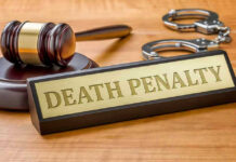 State Makes Firing Squad Primary Execution Method! Gavel, handcuffs, and Death Penalty sign on desk.