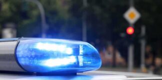 Police car blue siren light flashing
