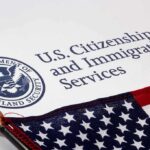 ICE Farm Raid Shocks Homeland U.S. Citizenship and Immigration Services document with American flag