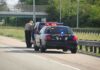 Hot-Car Horror: STONED Father Neglects Baby Police officer conducting a traffic stop on a highway