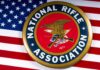 NRA emblem on American flag background