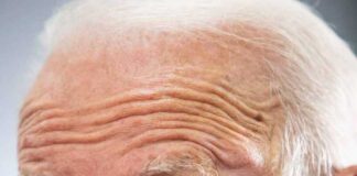 older man speaking in close-up portrait