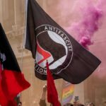 Antifa Mob STORMS Church, Attack Conservative Star protesters with antifascist flags and purple smoke
