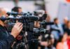 Mamdani Ignites Firestorm Days Before 9/11 Video cameras on tripods at a media event