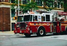 27 Students Killed in Blazing School Inferno Fire truck turning on a city street
