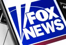 Fox News GRILLS Iran President During Cagey Interview Fox News logo displayed on a smartphone screen