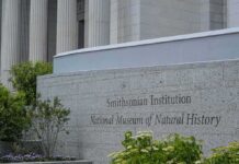Trump Slaps Warning On US Museums Smithsonian Institution museum exterior with engraved stone sign