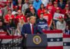 Trump Issues End Date For Iran War Donald Trump speaks at a rally podium; Christian Jones and Bear Pascoe are in the crowd behind him