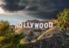 Hollywood sign on hillside under dramatic clouds