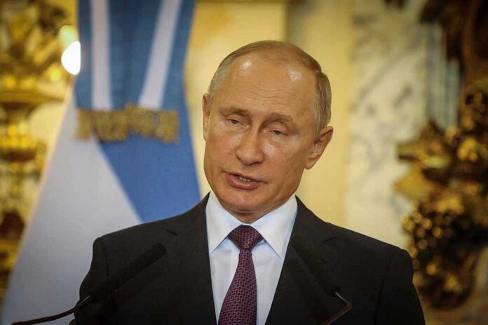 Vladimir Putin speaking at a podium with microphones