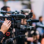 Biden Book Immediately Pulled Before Launching Video cameras on tripods at a media event