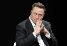 Musk Documentary Hit With Shocking Censorship Elon Musk seated in a dark setting with hands steepled near his face