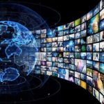 Newsom Lawyers Up – DOJ Heat Builds! Digital globe with curved wall of multimedia screens