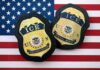 ICE Shooting Sparks Street Showdown – Protestors Clash! ICE badges on an American flag background