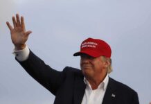MAGA Festival FLOPS – Canceled After Selling Only 6 Tickets Donald Trump waving in a red cap