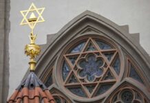 Teen STABBED In Synagogue Attack – City Stunned Star of David atop synagogue roof with stained glass window