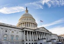 Billionaire’s Epstein Pal Fuels Dem Ad Blitz United States Capitol building under a blue sky